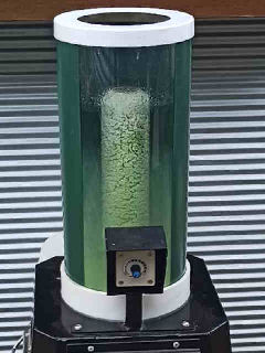 Photo showing paint residue draining from inside of chamber.